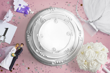 White Wedding cake  with copy space and wedding accessories on a pink background