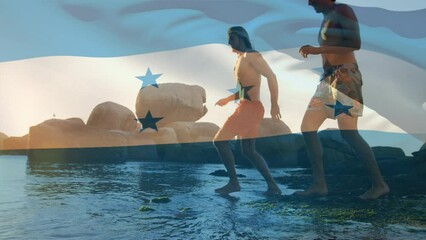 Animation of flag of honduras over diverse group of friends at beach - Powered by Adobe