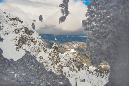 Tatar mountains through snow-covered window © fotomaster
