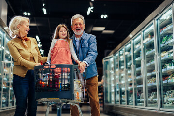 Family shopping together in Supermarket