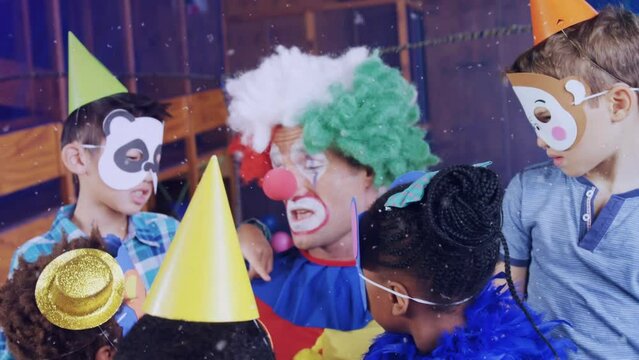 Animation of snow falling over diverse children and clown at birthday party