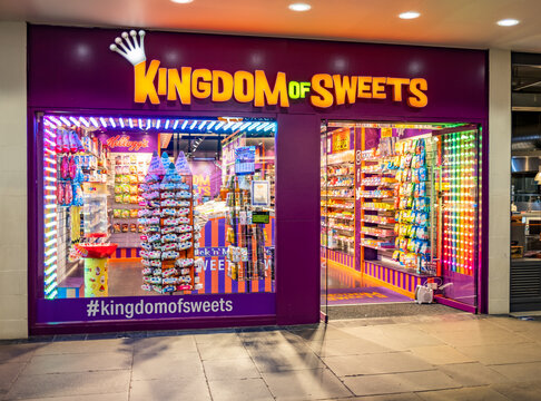 The Exterior Of The Kingdom Of Sweets Candy Or Sweet Shop In The City Of Cambridge. Captured Early Evening, November 2021.