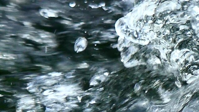 Abstract bubbling and rushing river water