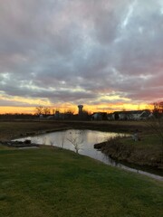 Naklejka premium sunset over the river