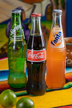 East Rutherford, New Jersey, USA  - APRIL 29, 2020: Glass bottled soda drinks, Sprite, Coca Cola and Fanta at a Mexican Restaurant. EDITORIAL USE ONLY