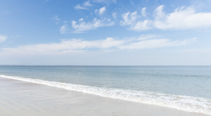 Ocean, beach, blue sky white clouds