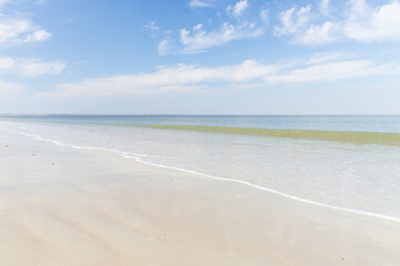 Ocean, beach, blue sky white clouds