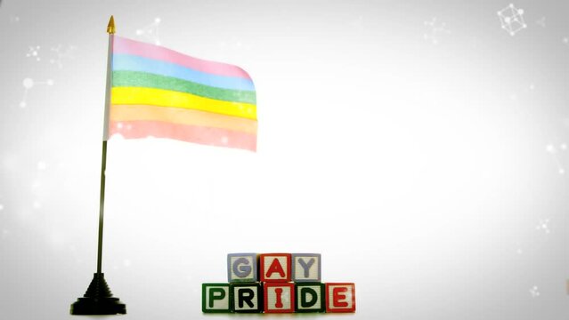 Animation of gay pride text over rainbow lgbt flag