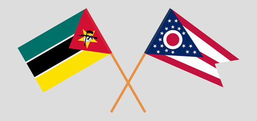 Crossed flags of Mozambique and the State of Ohio. Official colors. Correct proportion