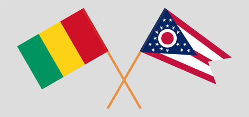 Crossed flags of Guinea and the State of Ohio. Official colors. Correct proportion