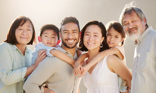 Family Is Everything. Cropped Shot Of A Happy Diverse Multi-generational Family At The Beach.