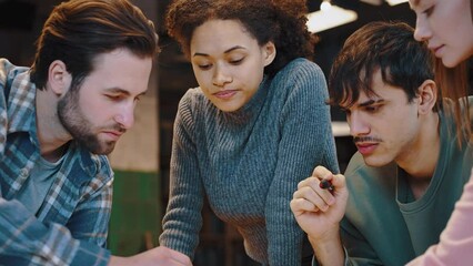 Mixed race female talk to friends working on data structure