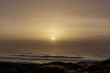 Sunset on the beach of Nazare in Portugal