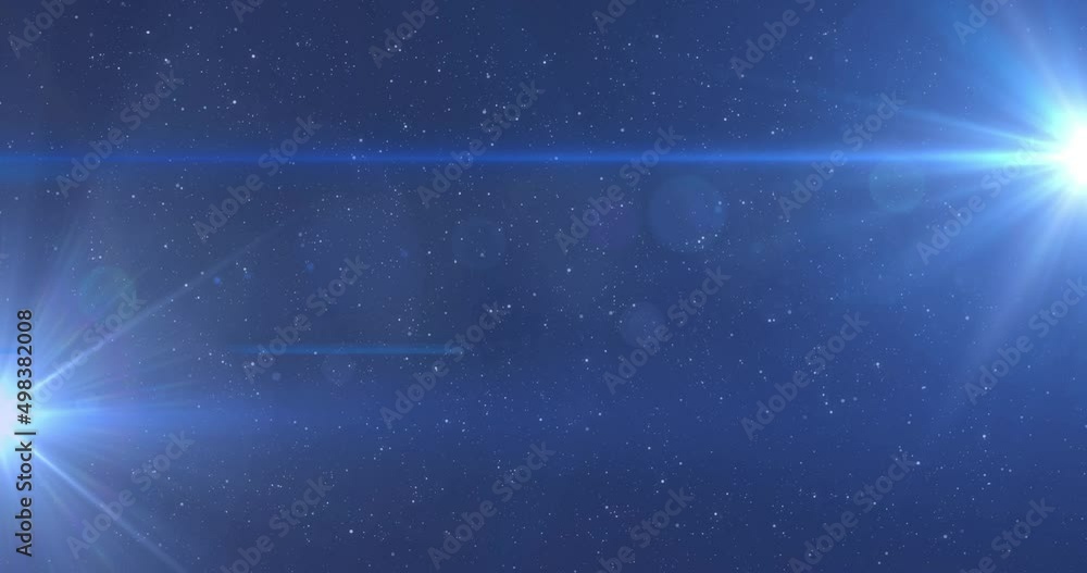 Wall mural animation of glowing blue lights moving over spots of light and stars in background