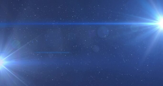Animation of glowing blue lights moving over spots of light and stars in background