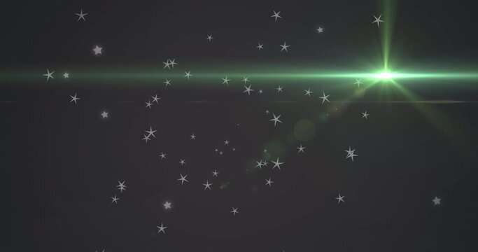 Animation of glowing green light moving over stars in background