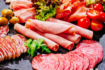 Slices of delicious spanish sausage salami. Healthy food concept.