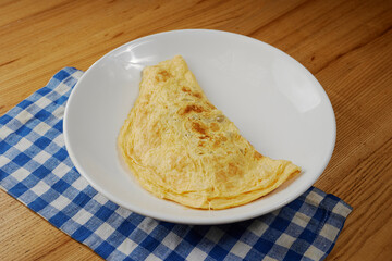 big omelet in a bowl