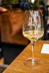 Glass of Chilean Chardonnay Viognier white wine served in restaurant