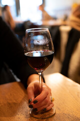 Tasting of dry Italian primitivo red wine in Italian cantina restaurant in Puglia