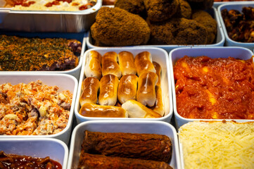Assortment of gourmet meat dishes in butchery delicatessen shop