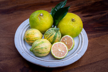 Fresh ripe bergamot citrus fruit and pink tiger lemons