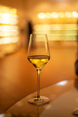 Tasting of brut champagne sparkling wine produced by traditional method in underground caves