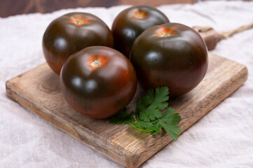 Healthy vegetarian food, reddish brown sweet kumato tomatoes