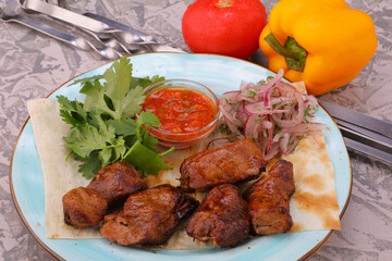 meat kebab is a national dish grilled meat on coals with sauce for the menu high-quality photo 