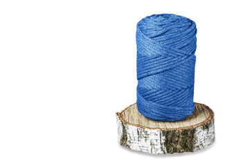 A skein of blue cotton cord, consisting of threads twisted together.