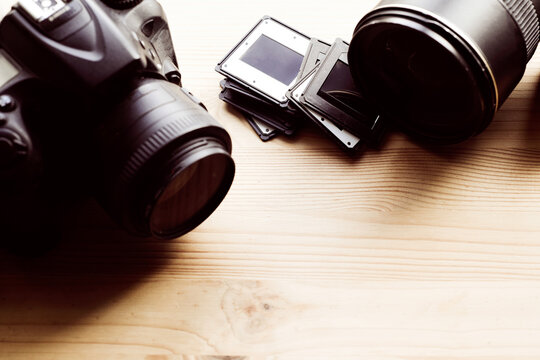 Camera lens and photographic slides for film projector