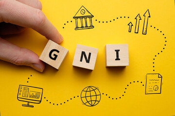Acronym GNI or Gross National Income. letters on cubes - obrazy, fototapety, plakaty