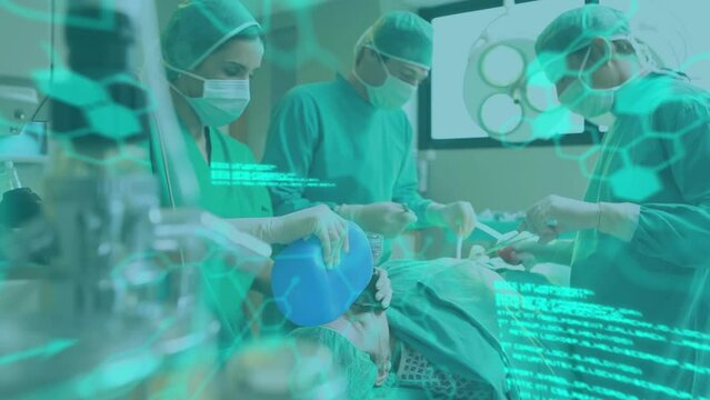 Animation of medical information and data processing over surgeons operating on patient in theatre