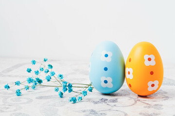 Easter. Multicolored eggs. Yellow and blue Easter decorations.