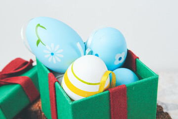 Easter. Multicolored eggs. Yellow and blue Easter decorations.