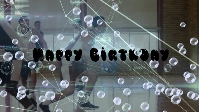 Animation of happy birthday text and bubbles over diverse group of basketball players at gym