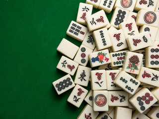 The mahjong on table ancient asian board game close up image - obrazy, fototapety, plakaty