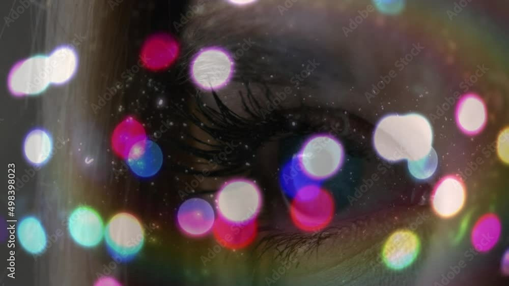 Poster Animation of light spots over eye of woman