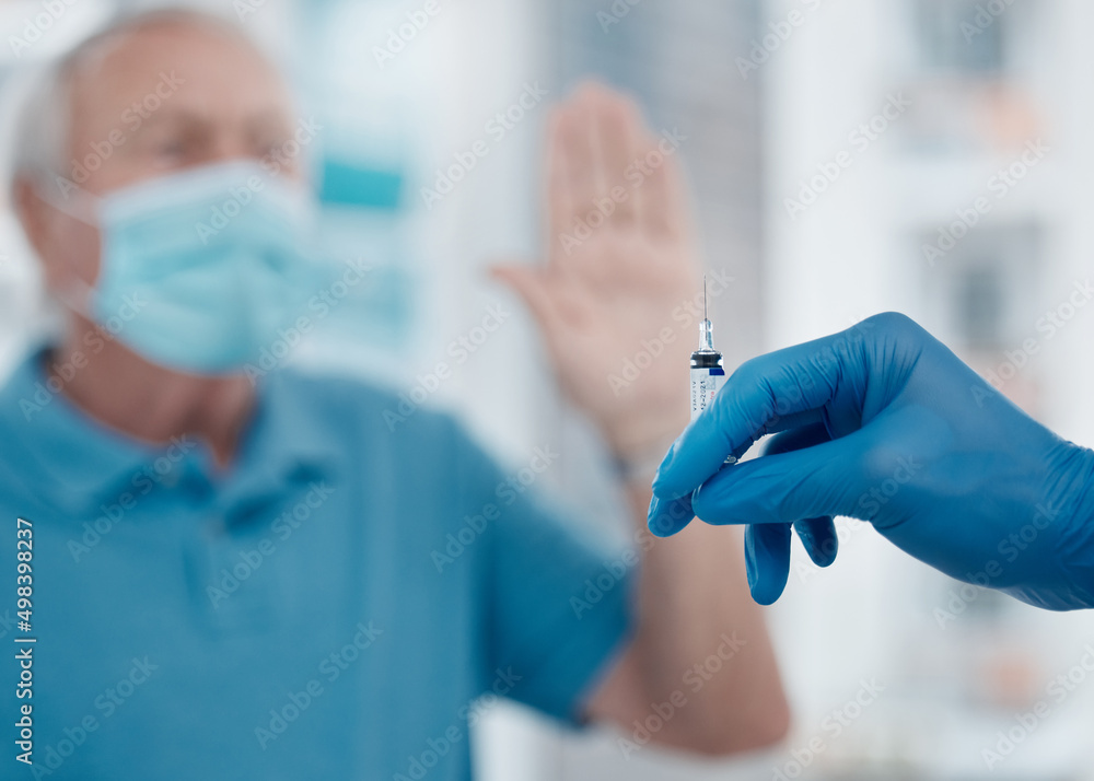 Poster are there any risks. cropped shot of a senior man gesturing to stop an unrecognizable doctor from in