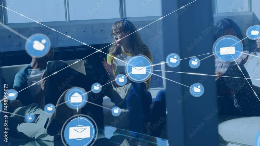 Poster animation of network of connections with icons over diverse business people using laptops