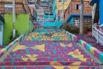 colorful neighborhood with graffiti staircase