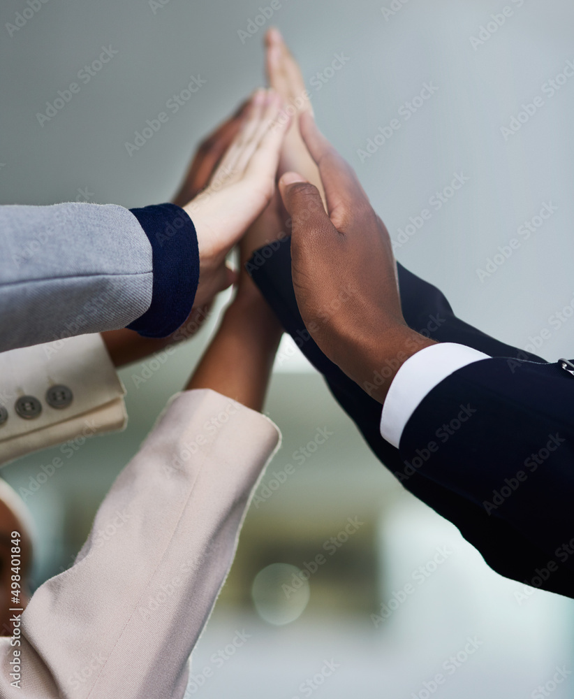 Poster With teamwork, success is inevitable. Cropped shot of a group of colleagues giving each other a high five.