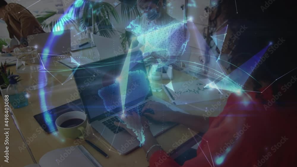 Poster animation of globe and shapes over diverse business people with face masks using laptops