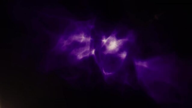 Animation of light trails over smoke on black background