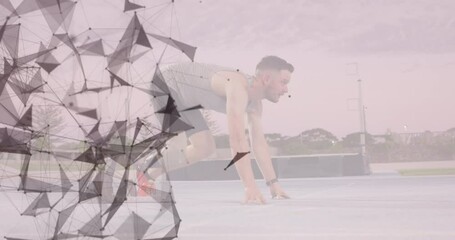 Animation of geometrical shapes over caucasian man with running blade preparing to start - Powered by Adobe