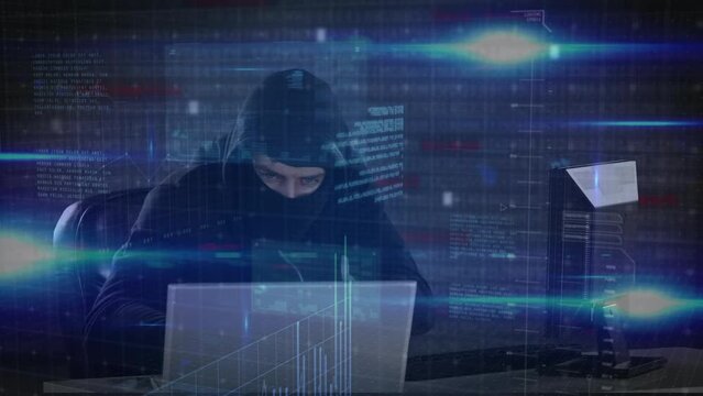 Animation of data processing over caucasian male computer hacker in balaclava using laptop