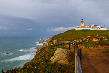 Fototapeta na wymiar Cape Roca (Cabo da Roca), the most westerly point of continental Europe offers breathtaking view of the Atlantic Ocean and the coast