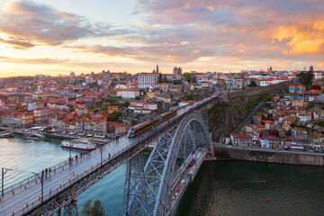 Vista of the historical city Porto bathed in the sunset golden glow