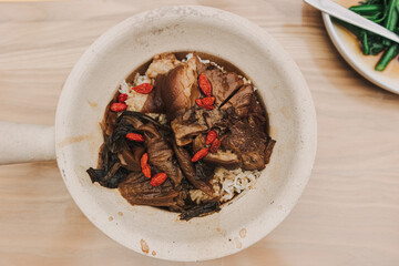 Khao kha mu Thai food steamed rice topped with stewed pig's trotter. High quality photo