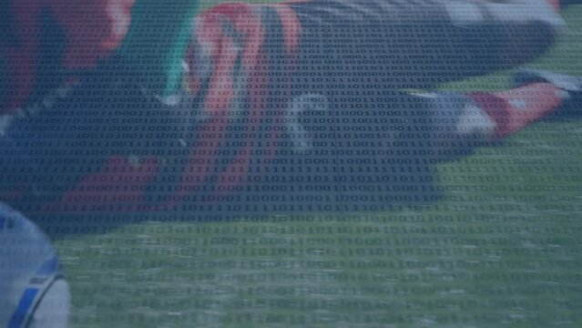 Animation of binary coding over diverse football players on stadium